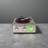 Retro black and gold color audio equipment with a green tuning knob for the turntable Application Scenario